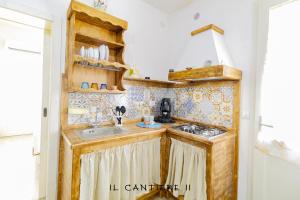 Kuchyň nebo kuchyňský kout v ubytování Il Cantiere - Casa Di Una Volta.
