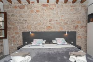 Postel nebo postele na pokoji v ubytování Apartment Libra downtown Šibenik