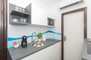 Kuchyň nebo kuchyňský kout v ubytování Apartment Libra downtown Šibenik