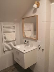 Kúpeľňa v ubytovaní Apartamenty Lawendowy Zakątek 7