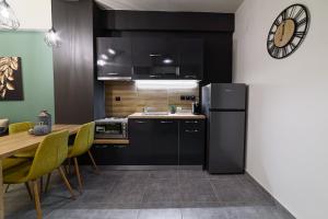 Kuchyň nebo kuchyňský kout v ubytování DK Luxury Loft