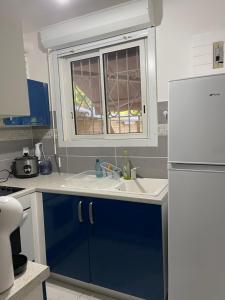 Una cocina o kitchenette en Mon petit cocon