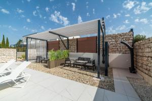 Patio alebo iná vonkajšia časť ubytovania PINNA RESIDENCE - PINNA