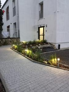 Vonkajšia záhrada v ubytovaní Apartamenty Lawendowy Zakątek 7