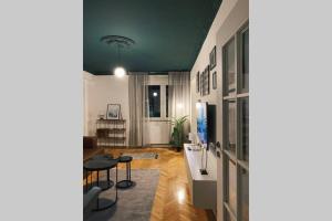 Et tv og/eller underholdning på Etern Stays - Bohemian Apartment