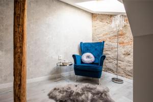 Гостиная зона в Apartmán Blue Moon +21 фотография