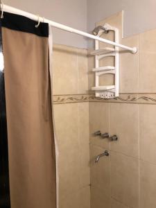 Kylpyhuone majoituspaikassa CASTELLNOVO HOTEL