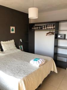Ένα ή περισσότερα κρεβάτια σε δωμάτιο στο CASTELLNOVO HOTEL