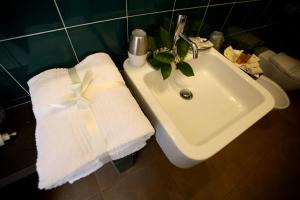 Ett badrum på Hotel Villa Pimpina