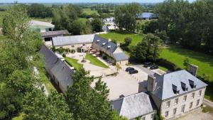 an aerial view of a building with a courtyard at Domaine Utah Beach - Le Grand Hard in Sainte-Marie-du-Mont