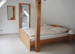 Postel nebo postele na pokoji v ubytování Casa Karp "Maisonette"