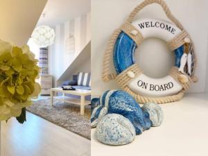 Posteľ alebo postele v izbe v ubytovaní APARTAMENT AURA TORUŃSKA 15