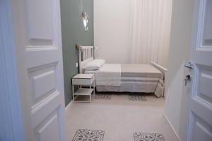 Cama ou camas em um quarto em Ursino's Luxury