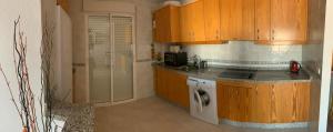 A kitchen or kitchenette at Apartamento del sol