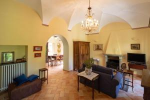 a living room with a couch and a table at La loggia dei frati in Cannero Riviera