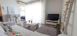 โทรทัศน์และ/หรือระบบความบันเทิงของ Appartement Ajaccio vue mer panoramique