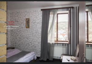 Letto o letti in una camera di Baron Hotel