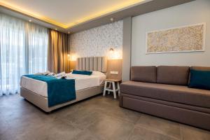 Postel nebo postele na pokoji v ubytování VERANO LUXURY STUDIOS
