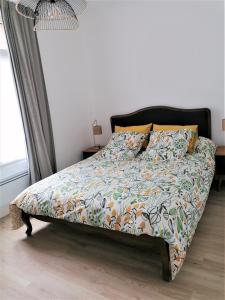 Säng eller sängar i ett rum på Les Marguerites, maison proche de Chambord