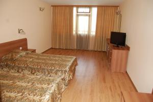 Un pat sau paturi într-o cameră la Hotel Svetitsata