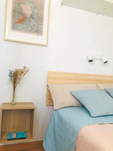 Posteľ alebo postele v izbe v ubytovaní Apartamento The Wall Xperience