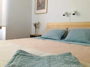 Posteľ alebo postele v izbe v ubytovaní Apartamento The Wall Xperience