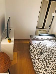 Posteľ alebo postele v izbe v ubytovaní Apartamento The Wall Xperience