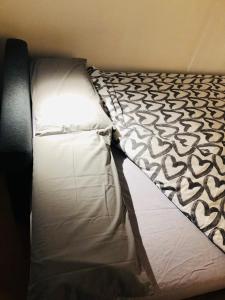 Posteľ alebo postele v izbe v ubytovaní Apartamento The Wall Xperience