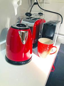 Príslušenstvo na prípravu kávy alebo čaju v ubytovaní Apartamento The Wall Xperience