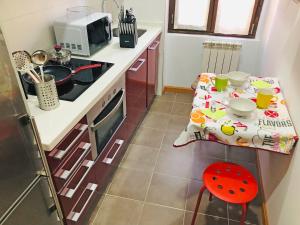 Kuchyňa alebo kuchynka v ubytovaní Apartamento The Wall Xperience
