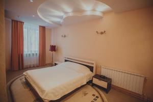 Cama o camas de una habitación en Hotel Novaya