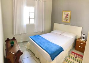 Casa com ótima localização客房内的一张或多张床位