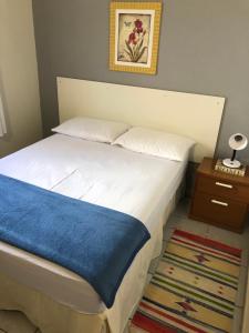 Casa com ótima localização客房内的一张或多张床位