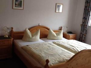 Postel nebo postele na pokoji v ubytování Landgasthaus Hesse