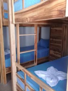 Postel nebo postele na pokoji v ubytování Turtle Island Homestay