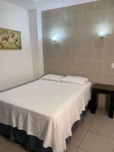 Postel nebo postele na pokoji v ubytování Apart Hotel Express