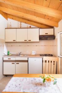 Kuchyň nebo kuchyňský kout v ubytování Apartment Josipa
