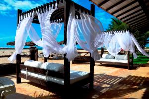 a set up for a wedding on the beach at Aimberê Eco Resort Hotel in Coqueiro