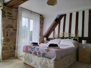 Katil atau katil-katil dalam bilik di Domaine FlorEl