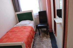 Postel nebo postele na pokoji v ubytování Hotel du Gambrinus