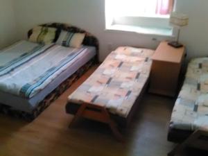 Letto o letti in una camera di U Tupáčků