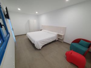 A bed or beds in a room at A Casa do Lado