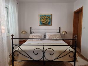Postel nebo postele na pokoji v ubytování Holiday Apartment 1