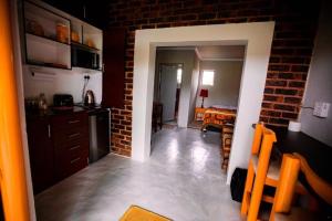 Kuchyň nebo kuchyňský kout v ubytování Inyameko BnB