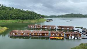 an aerial view of a resort on a river at Raya Buri Resort Kanchanaburi in Si Sawat
