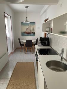 Kuchyň nebo kuchyňský kout v ubytování Holiday Home Cesarica