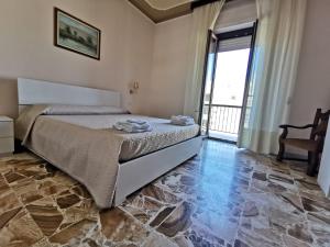 A bed or beds in a room at Alghermanzoni