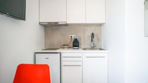 A cozinha ou cozinha compacta de Anfi Suites