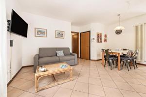 TV a/nebo společenská místnost v ubytování la casa del borgo con parcheggio