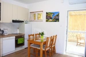Kuchyň nebo kuchyňský kout v ubytování Apartment Teraferma 2 + 14 fotografií